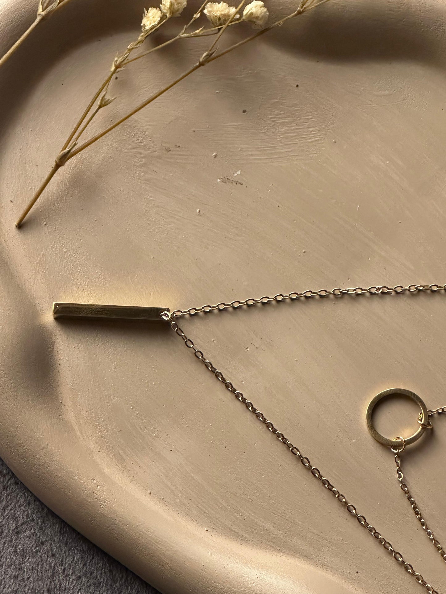 Golden double chain pendent